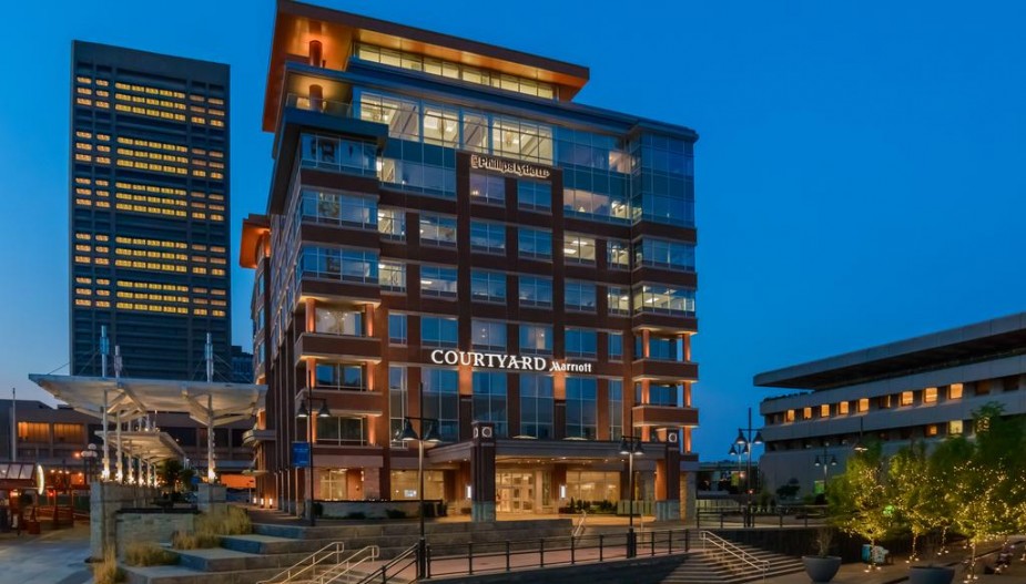A photo of the Courtyard Downtown hotel from outside at night