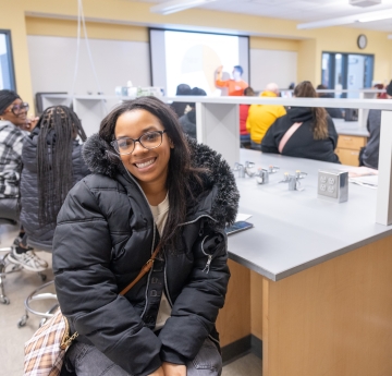 student in a lab style classroom