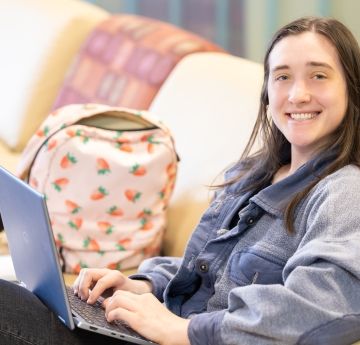 woman smiling with laptop